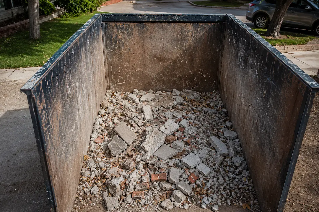 how full to load heavy debris dumpster